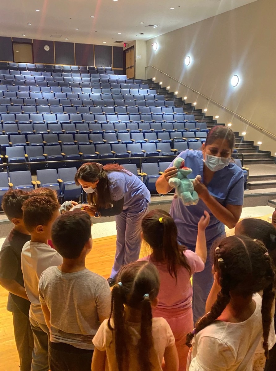 Dental hygienist teaching students